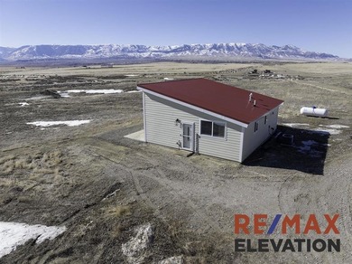 Set on 35.5 acres, this property features two modern homes, a