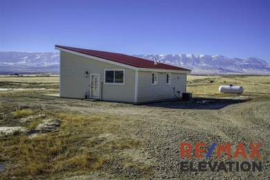 Set on 35.5 acres, this property features two modern homes, a