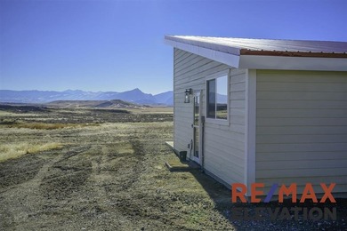 Set on 35.5 acres, this property features two modern homes, a