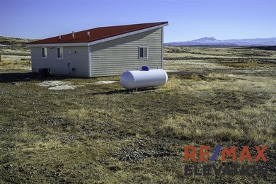 Set on 35.5 acres, this property features two modern homes, a