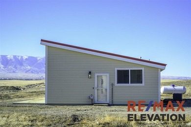 Set on 35.5 acres, this property features two modern homes, a