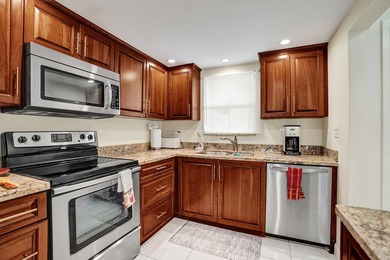 Updated 2 bedroom, 2 bathroom condo. Features an open floor plan - photo 2