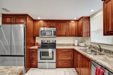 Updated 2 bedroom, 2 bathroom condo. Features an open floor plan - photo 3