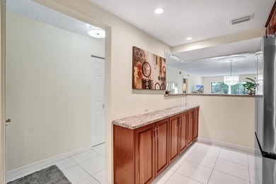 Updated 2 bedroom, 2 bathroom condo. Features an open floor plan - photo 5