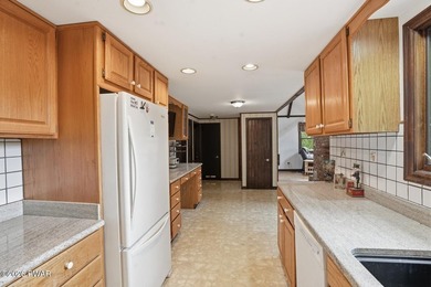 A massive floor-to-ceiling brick fireplace, rumored to contain 3 - photo 13