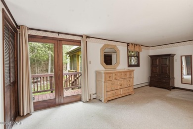 A massive floor-to-ceiling brick fireplace, rumored to contain 3 - photo 16