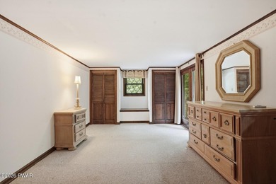 A massive floor-to-ceiling brick fireplace, rumored to contain 3 - photo 17
