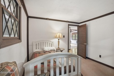 A massive floor-to-ceiling brick fireplace, rumored to contain 3 - photo 20