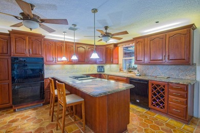 Nestled in the desirable community of Lake Clarke Shores, this - photo 20