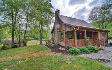 2br/2ba real log cabin sitting on 3.75 ACRES BORDERING OVER 100 - Lake Home For Sale in Cherry Log, Georgia