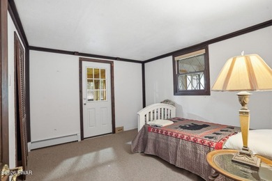 A massive floor-to-ceiling brick fireplace, rumored to contain 3 - photo 21