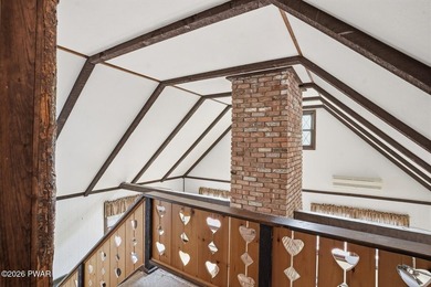 A massive floor-to-ceiling brick fireplace, rumored to contain 3 - photo 25