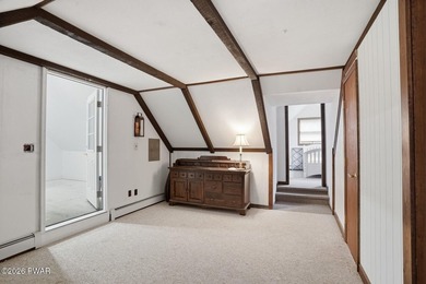 A massive floor-to-ceiling brick fireplace, rumored to contain 3 - photo 26
