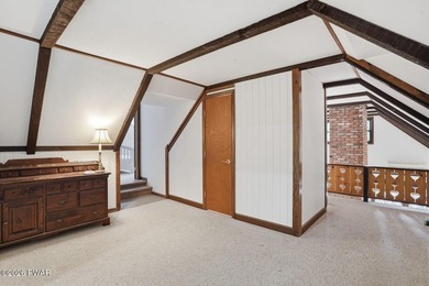 A massive floor-to-ceiling brick fireplace, rumored to contain 3 - photo 27