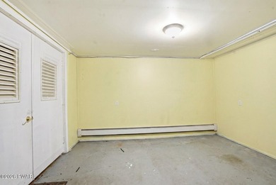 A massive floor-to-ceiling brick fireplace, rumored to contain 3 - photo 42