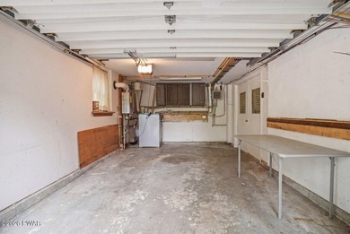A massive floor-to-ceiling brick fireplace, rumored to contain 3 - photo 43