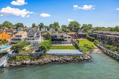 Set behind private gates on an oversized waterfront parcel, this - photo 4