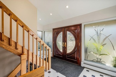 Set behind private gates on an oversized waterfront parcel, this - photo 7