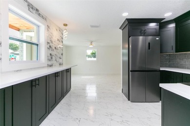 Move-in ready and newly renovated, this spacious 4-bedroom - photo 8