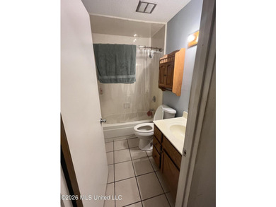 This well-maintained brick home offers a functional layout with - photo 11