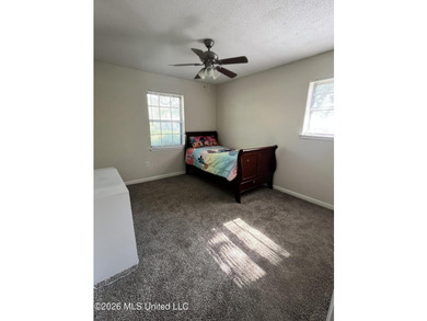 This well-maintained brick home offers a functional layout with - photo 13