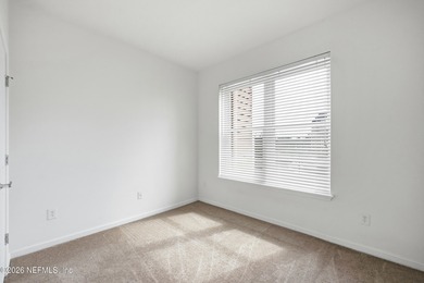 Welcome to easy, low-maintenance living in the highly desirable