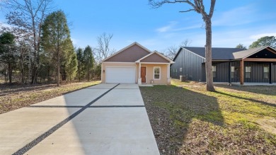 Lake Home For Sale in Log Cabin, Texas