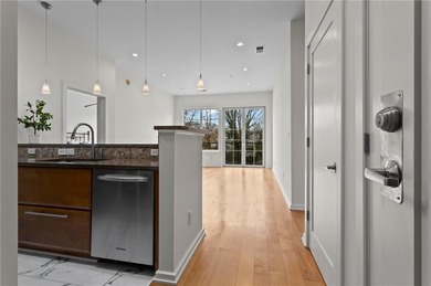 Welcome home to an elevated, turnkey condo experience in the