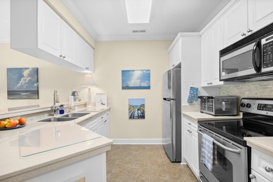 Your coastal getaway awaits at 703 Shearwater Court, Unit #304-a - photo 9