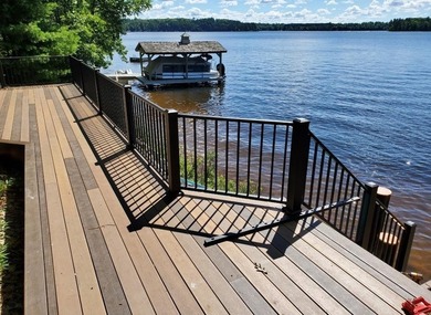 Located on the 28 Lake Chain, this exceptional property boasts - photo 4