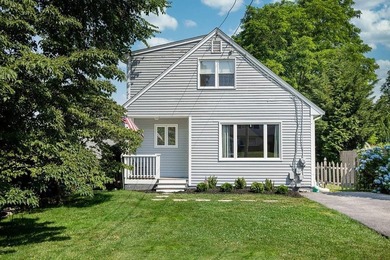 Bright, comfortable, and well-situated, this 3-bedroom, 2-bath - photo 1