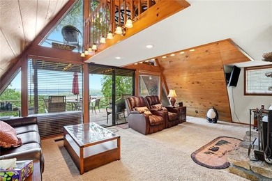 Fully furnished and cozy A-frame cabin situated on four lots in - photo 4