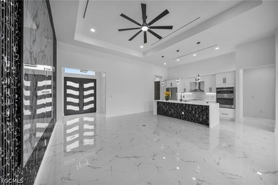 Step into modern Florida luxury in this brand-new 2026-built - photo 6