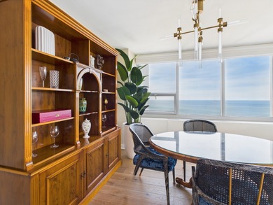 BREATHTAKING LAKEFRONT PARADISE IN THE SKY - A 3 BEDROOM, 3 BATH