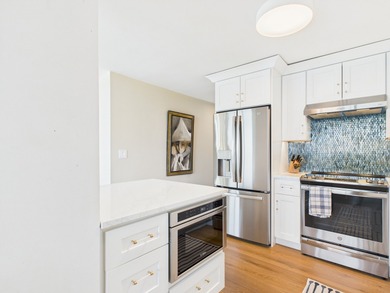 BREATHTAKING LAKEFRONT PARADISE IN THE SKY - A 3 BEDROOM, 3 BATH