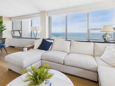 BREATHTAKING LAKEFRONT PARADISE IN THE SKY - A 3 BEDROOM, 3 BATH