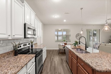 Meticulously maintained and professionally staged, this spacious - photo 12