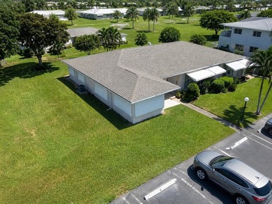 Charming first-floor end-unit in the Active Adult community of - photo 1