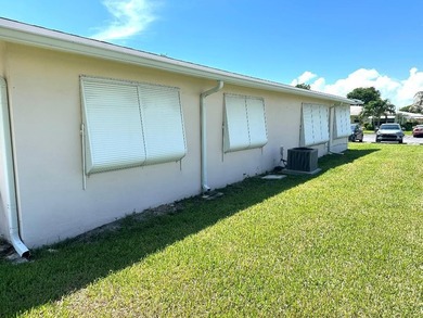 Charming first-floor end-unit in the Active Adult community of - photo 6