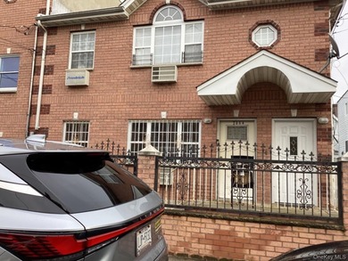 A rare find! This 19-year-young, brick-legal 2-family home is in - photo 1