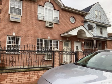 A rare find! This 19-year-young, brick-legal 2-family home is in - photo 2