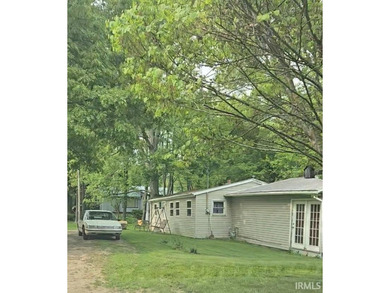 opportunity awaits in wall lake with this charming 2 bed 1 bath - photo 1