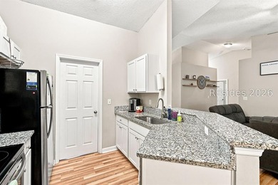 Welcome to this charming 4-bedroom, 2-bath home in the - photo 16