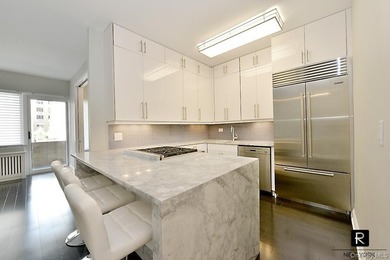 Step into sophisticated urban living in this stunning, barely - photo 6