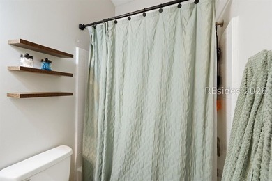 Welcome to this charming 4-bedroom, 2-bath home in the - photo 24