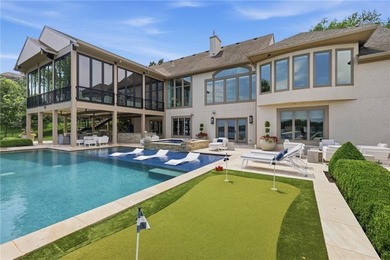 Luxury lakefront living awaits in Lake Winnebago! Situated on an - photo 1