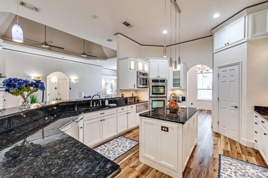 Welcome to an extraordinary Butler Farms residence where - photo 14