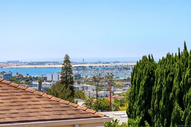 Perched in the heart of coveted Point Loma, this stunning 2,600 - photo 1