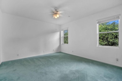 Welcome home to this beautifully updated villa in the highly - photo 13