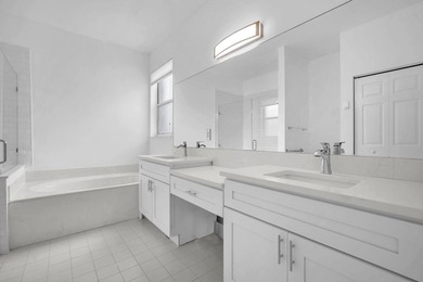Welcome home to this beautifully updated villa in the highly - photo 16